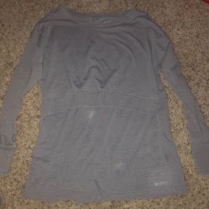 Long sleeve Calvin Klein shirt.